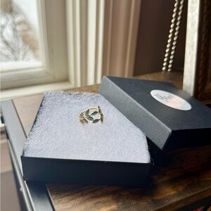 Adjustable Gold Leaf Ring with light blue stone inset